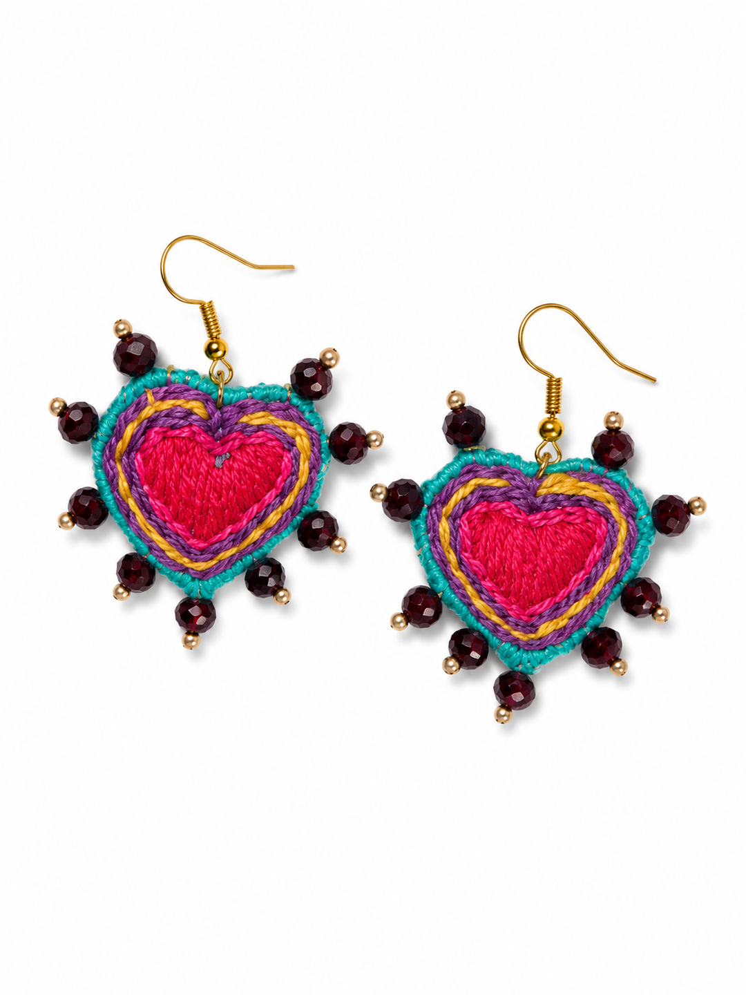 Colorful handmade boho heart earrings with layered embroidery and artisan beadwork on white background