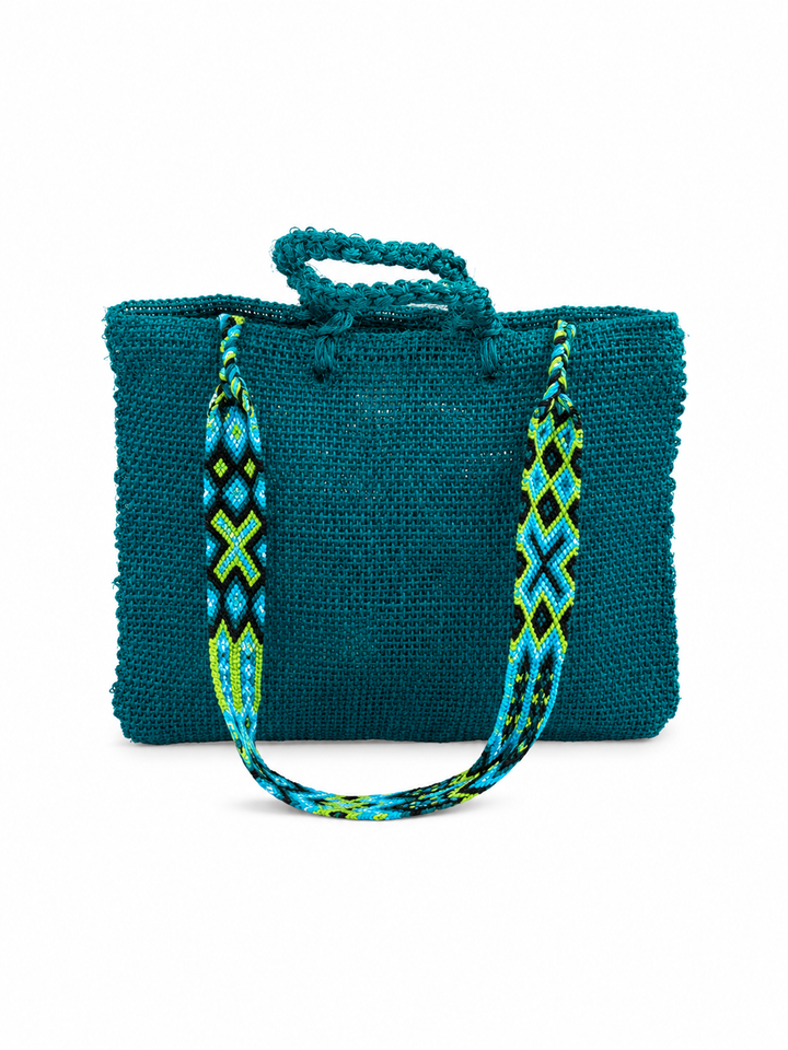 Back of Colorful handmade fish handbag crafted from natural ixtle fiber with tropical fish embroidery and artisan tassel detail
