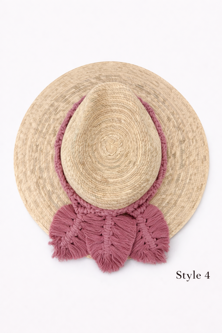 Natural straw wide brim hat with macrame leaf tassel detail, boho chic beach hat by Bootsologie on white background