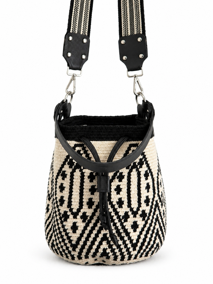     Boho woven bucket purse with adjustable striped strap and leather details neutral tones Bootsologie