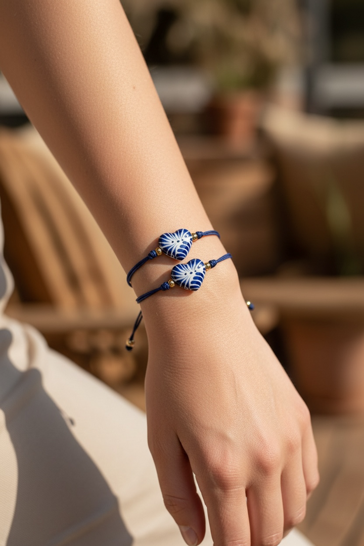Handmade Talavera Heart Shaped Bracelet in Silky Blue Cord from Puebla, Mexico.