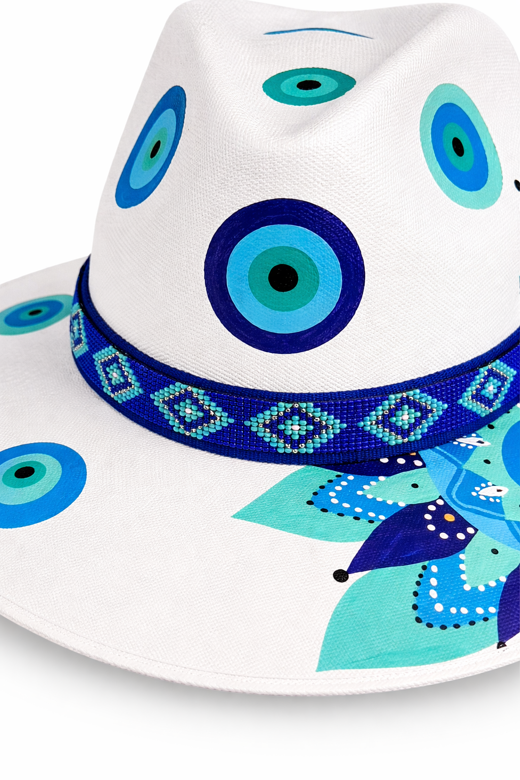 Colorful hand painted Mexican hat with eye motif artwork, structured wide brim silhouette, and boho style by Bootsologie 