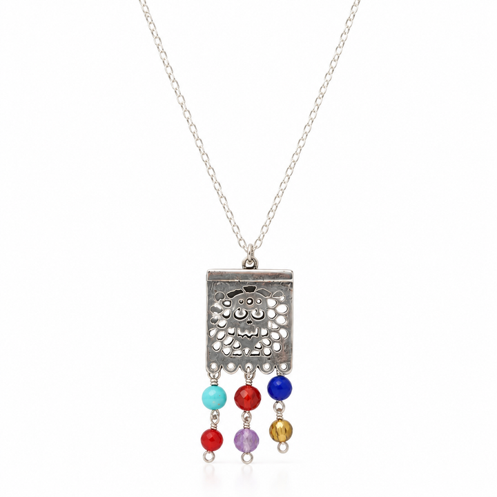 Sterling Silver .925 papel picado necklace with Mexican folk art pendant on white background