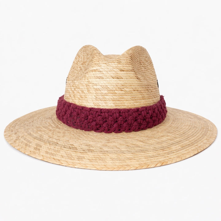 Natural straw sun hat with textured macrame band, stylish boho beach hat with wide brim summer accessory by Bootsologie on white background