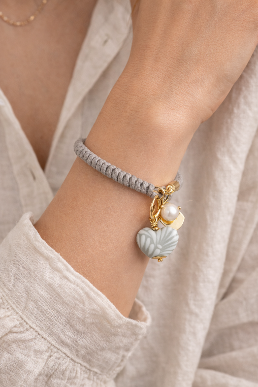 Mexican artisan-style bracelet with ceramic heart charm and freshwater pearl by Bootsologie