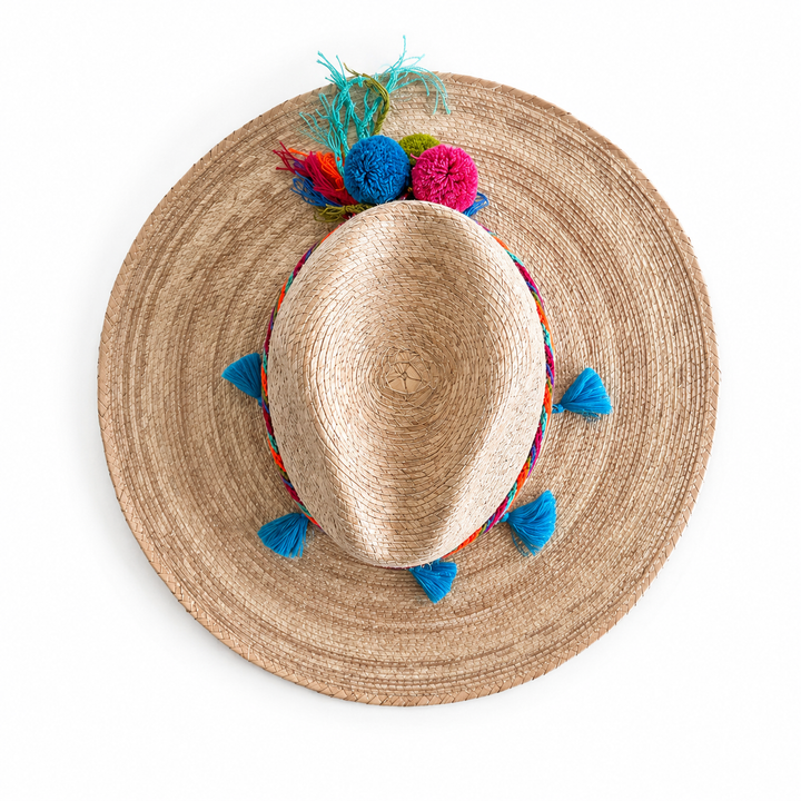 Wide brim straw beach hat for women with Colombian woven band and turquoise tassel accents