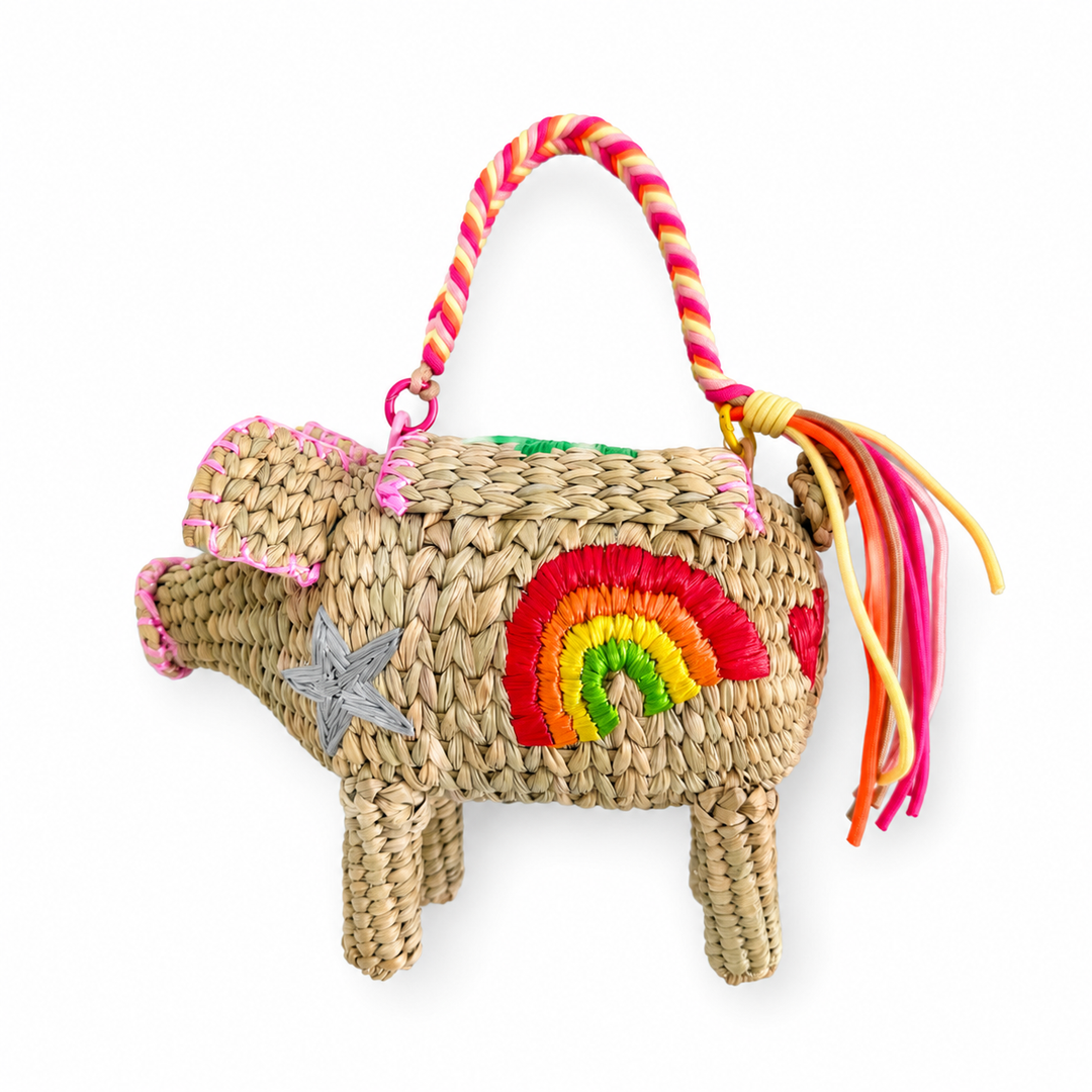Back view of handcrafted woven pig handbag showing natural straw texture and artisan embroidered finish.
