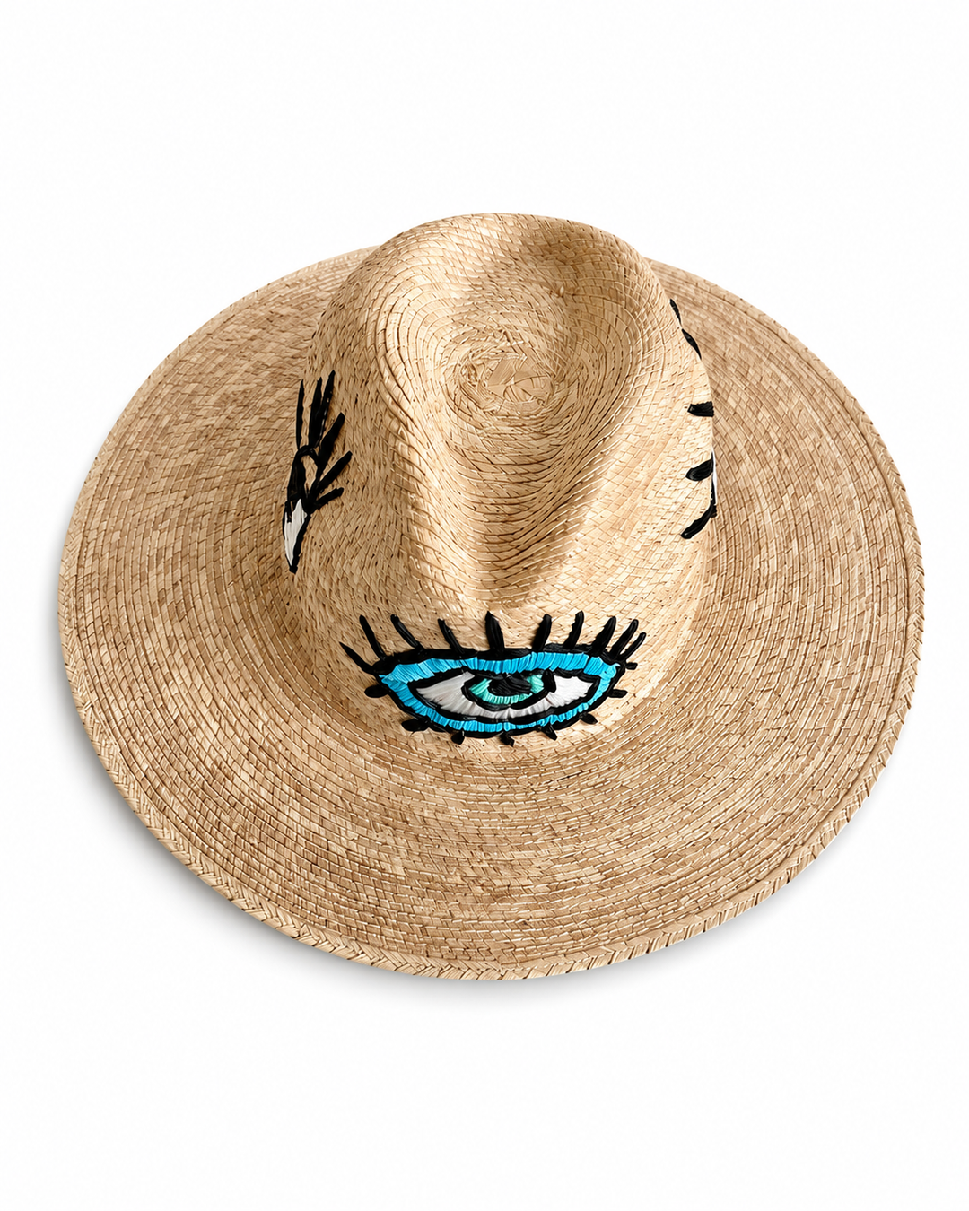 Wide brim straw beach hat with embroidered eye design and natural woven texture