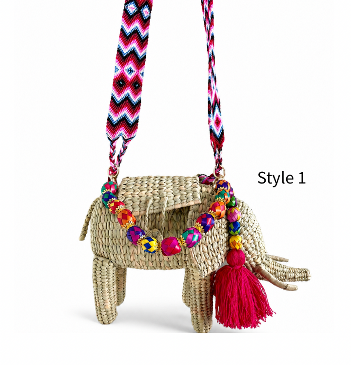 Woven elephant shaped purse with natural straw texture, multicolor beaded detail and long crossbody strap