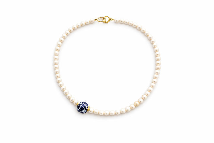 Mexican Talavera pearl necklace with hand painted ceramic pendant on white background