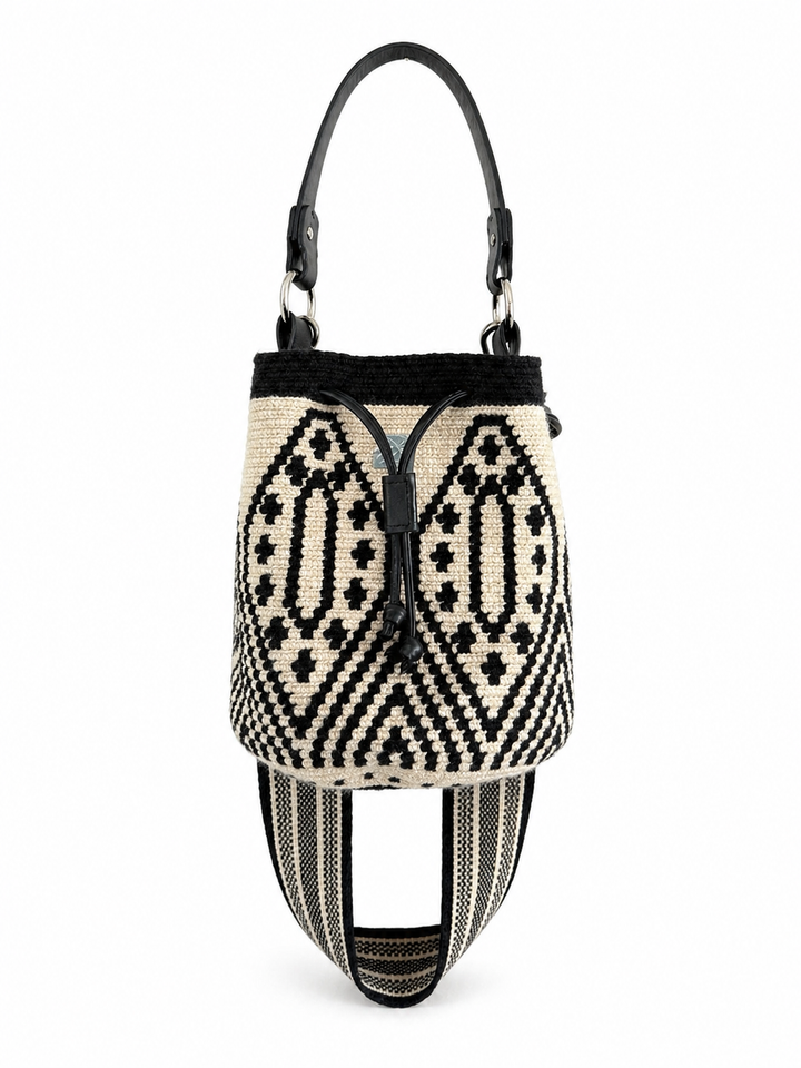     Handmade woven crossbody bucket bag black cream pattern leather trim strap front view Bootsologie