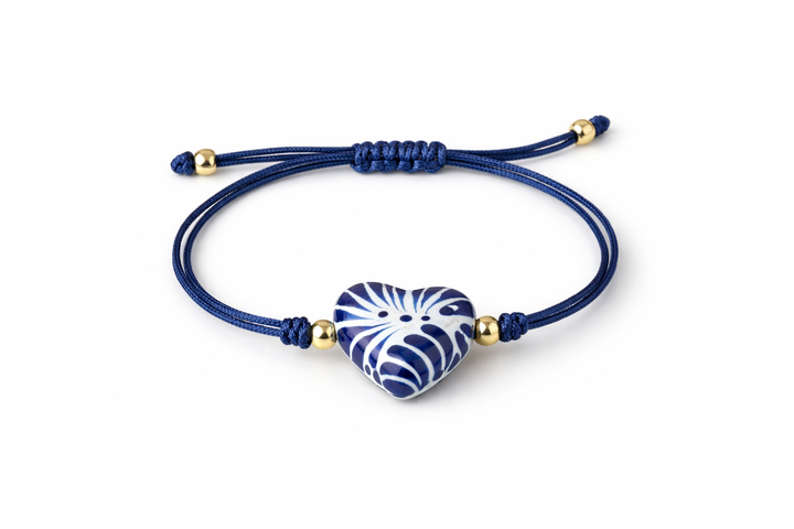 Handmade Talavera Heart Shaped Bracelet in Silky Blue Cord from Puebla, Mexico.