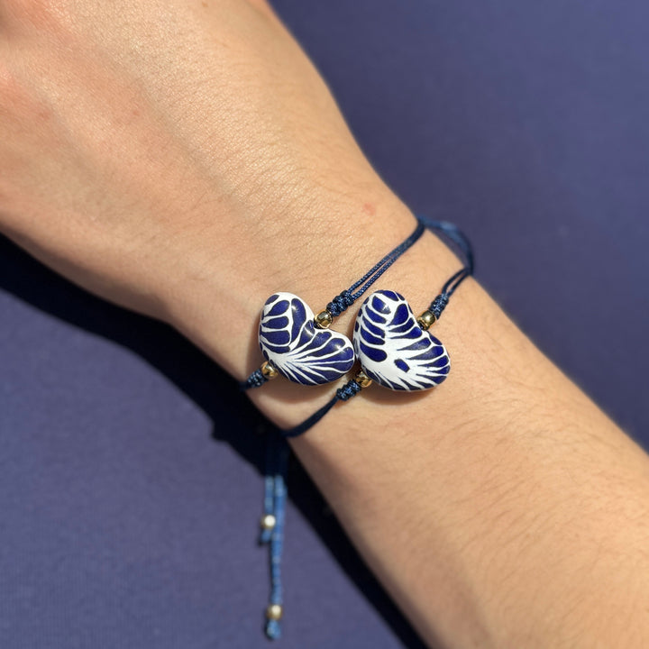 Handmade Talavera Heart Shaped Bracelet in Silky Blue Cord from Puebla, Mexico.