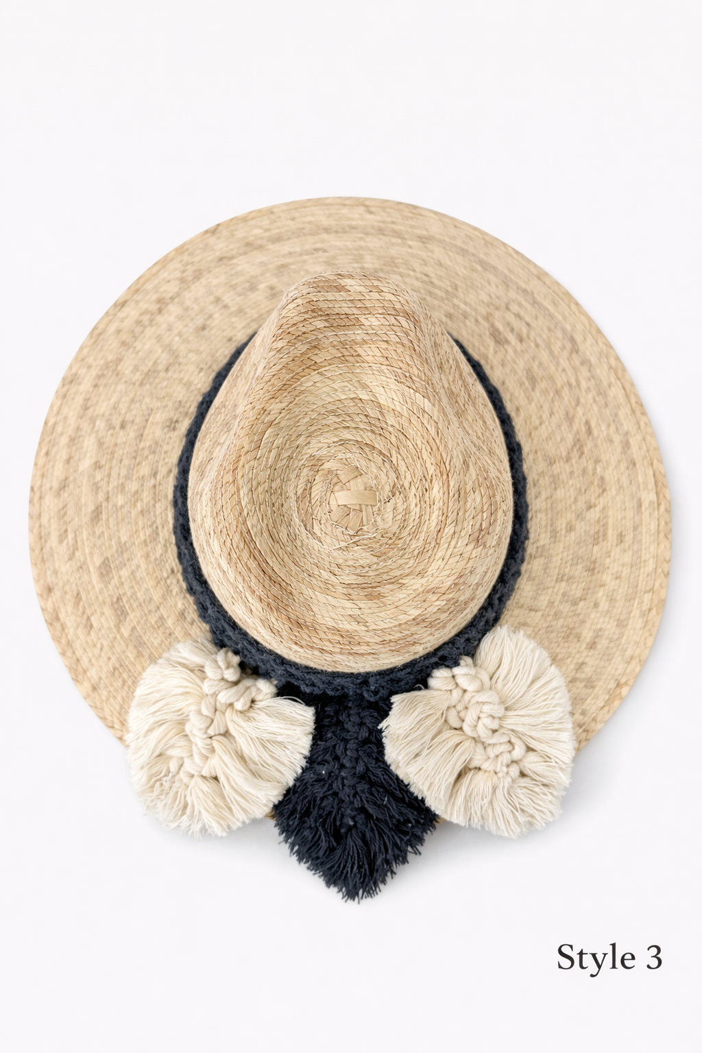 Natural woven straw beach hat with macrame tassel band, boho vacation hat by Bootsologie isolated on white background