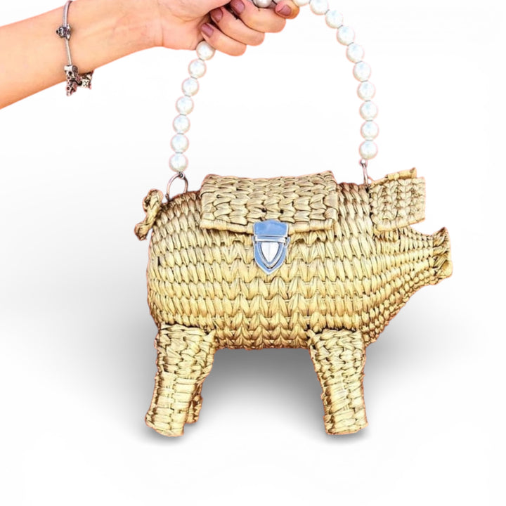 Handmade pig-shaped straw palm clutch bag, gold woven texture, artisan evening clutch made in Mexico, statement animal purse for weddings and special events