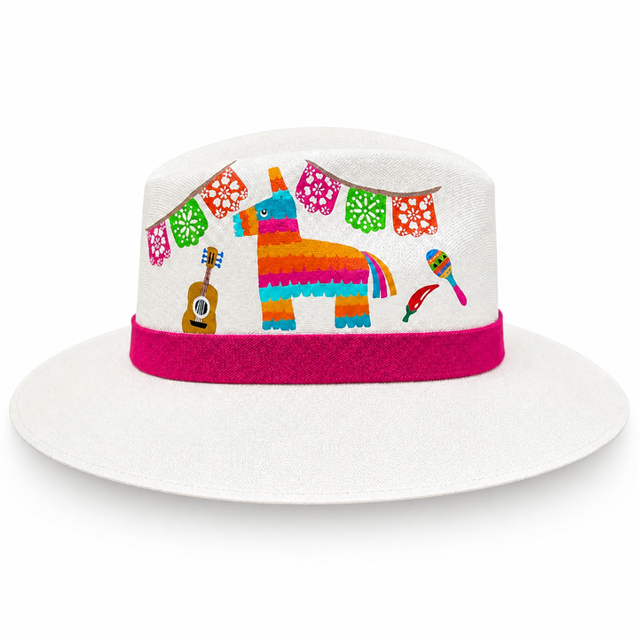 White wide brim Mexican artisan hat on clean background featuring vibrant fiesta artwork, colorful piñata design, papel picado banner, and pink hat band
