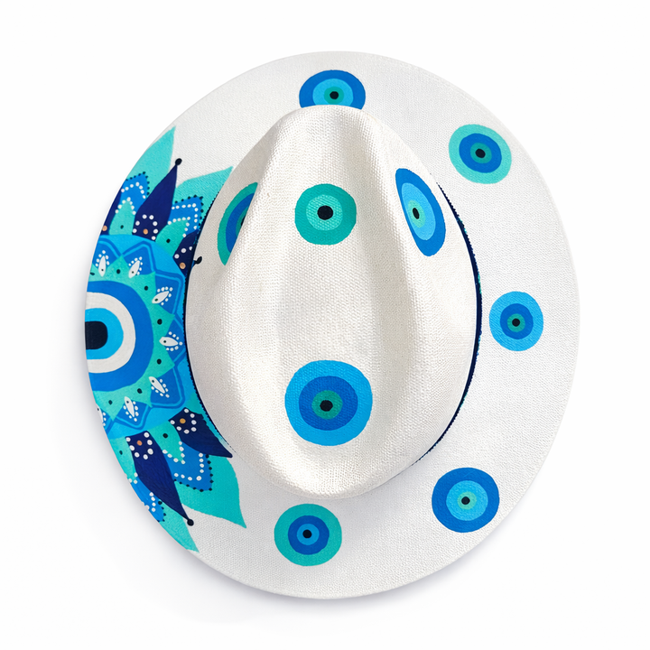 Mexican artisan wide brim hat on clean white background featuring hand painted eye motif design and vibrant Huichol beaded hat band Bootsologie