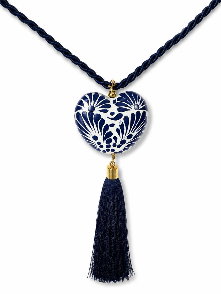 Close-up of hand-painted genuine Talavera heart necklace showing cobalt blue floral ceramic detail