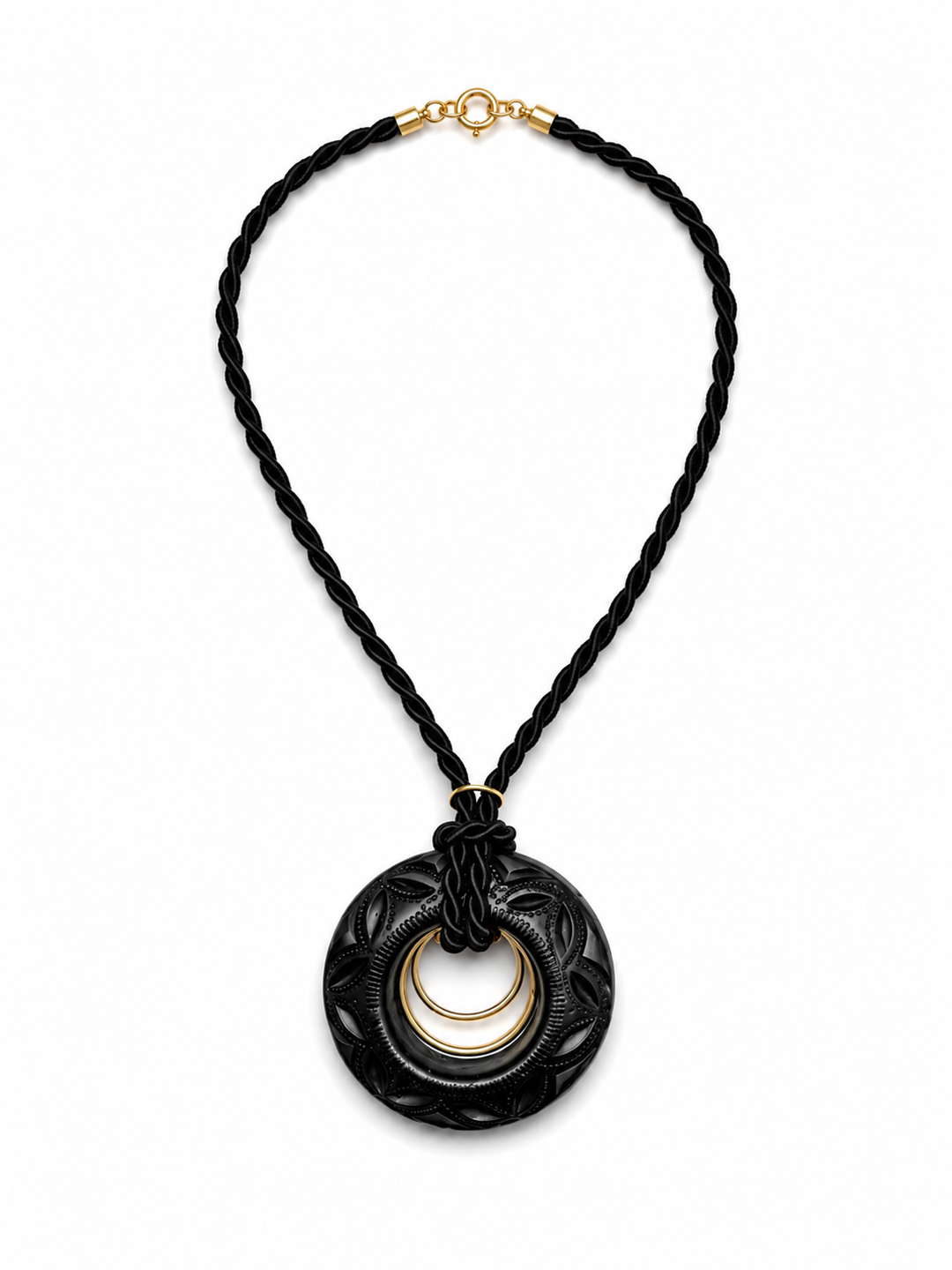 Handmade Barro Negro statement necklace on white background featuring hand carved black clay pendant with double gold rings and twisted black cord by Bootsologie