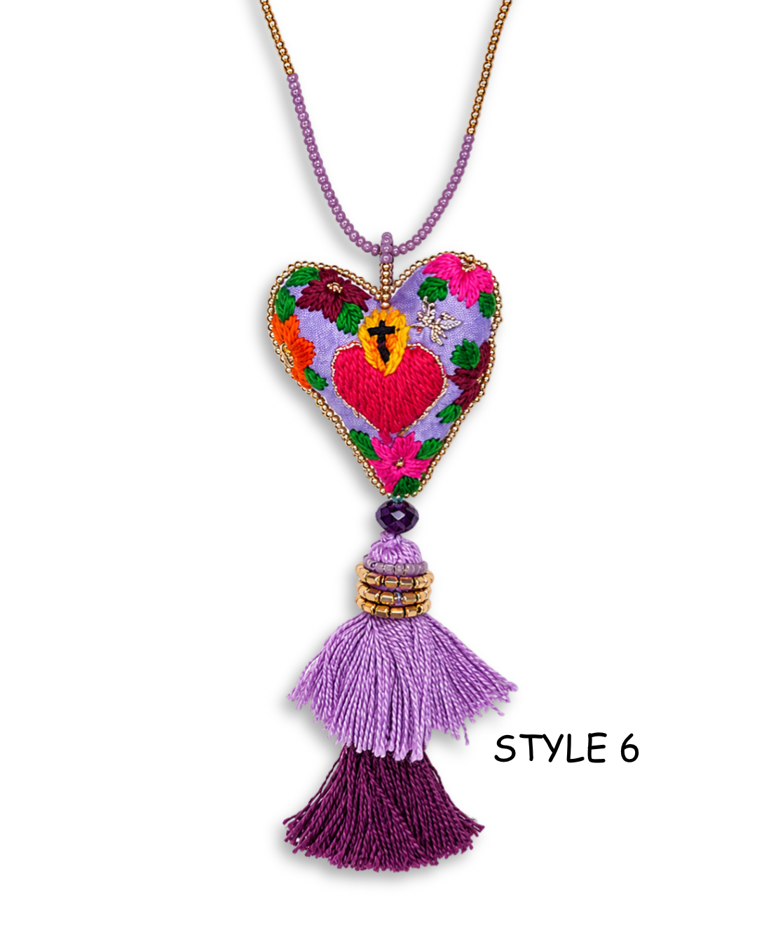 Artisan Mexican folk art necklace with floral sacred heart embroidery and red crystal tassels on white background