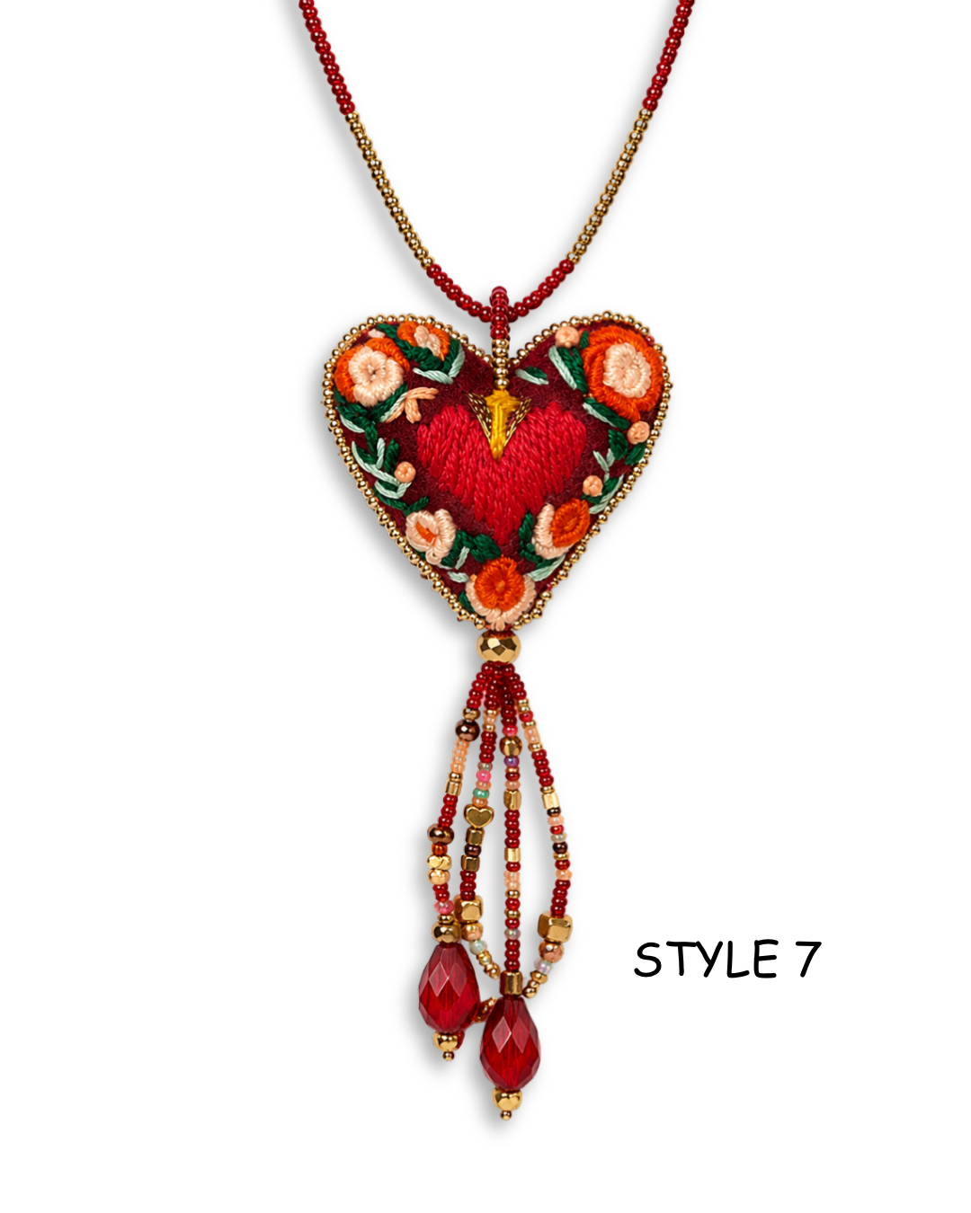 Bright floral heart necklace with colorful embroidery and dangling bead fringe on white background