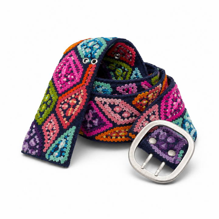 Navy Peruvian embroidered wool belt with colorful raised stitching and silver buckle on white background.