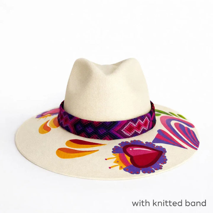 Hand painted Mexican fedora hat on white background, artisan straw hat with colorful design Bootsologie
