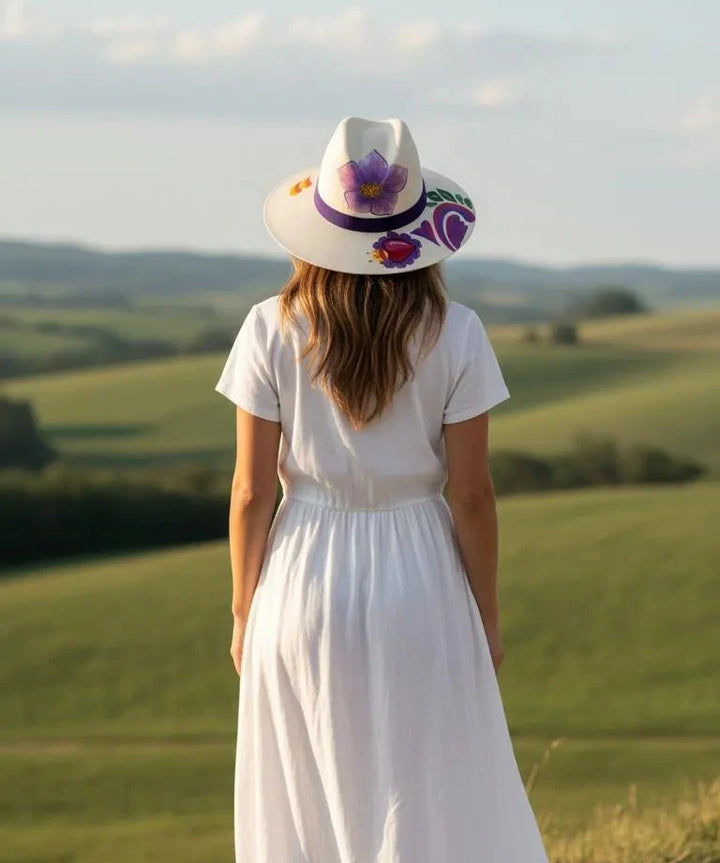Woman wearing hand painted Mexican fedora hat, boho western style straw hat Bootsologie