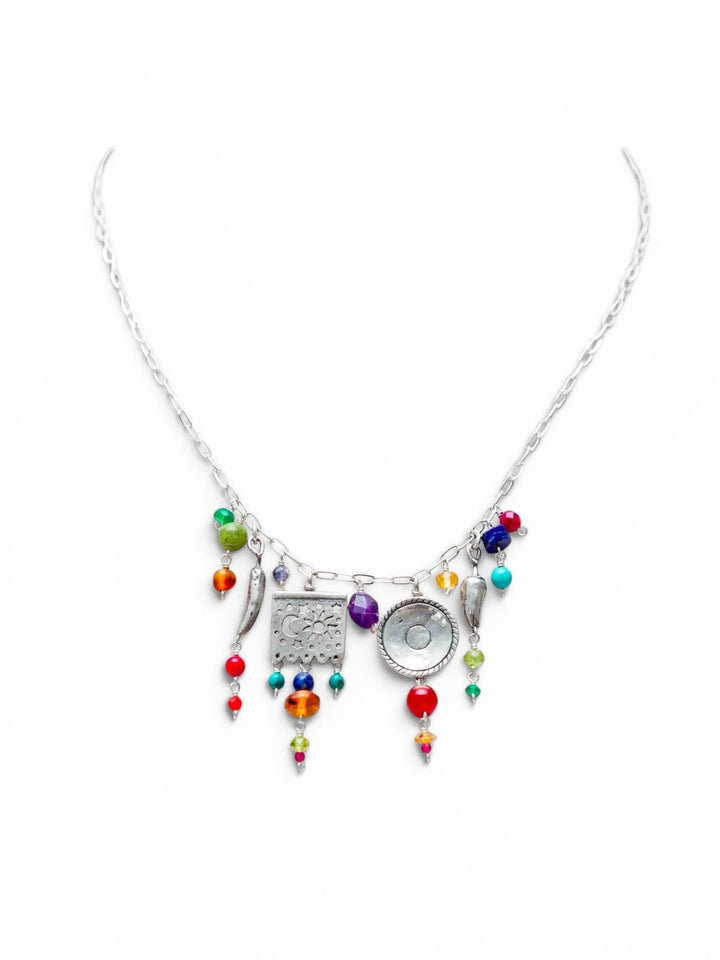 Handmade Mexican fiesta silver charm necklace with papel picado sombrero chile charms and colorful gemstone drops on white background