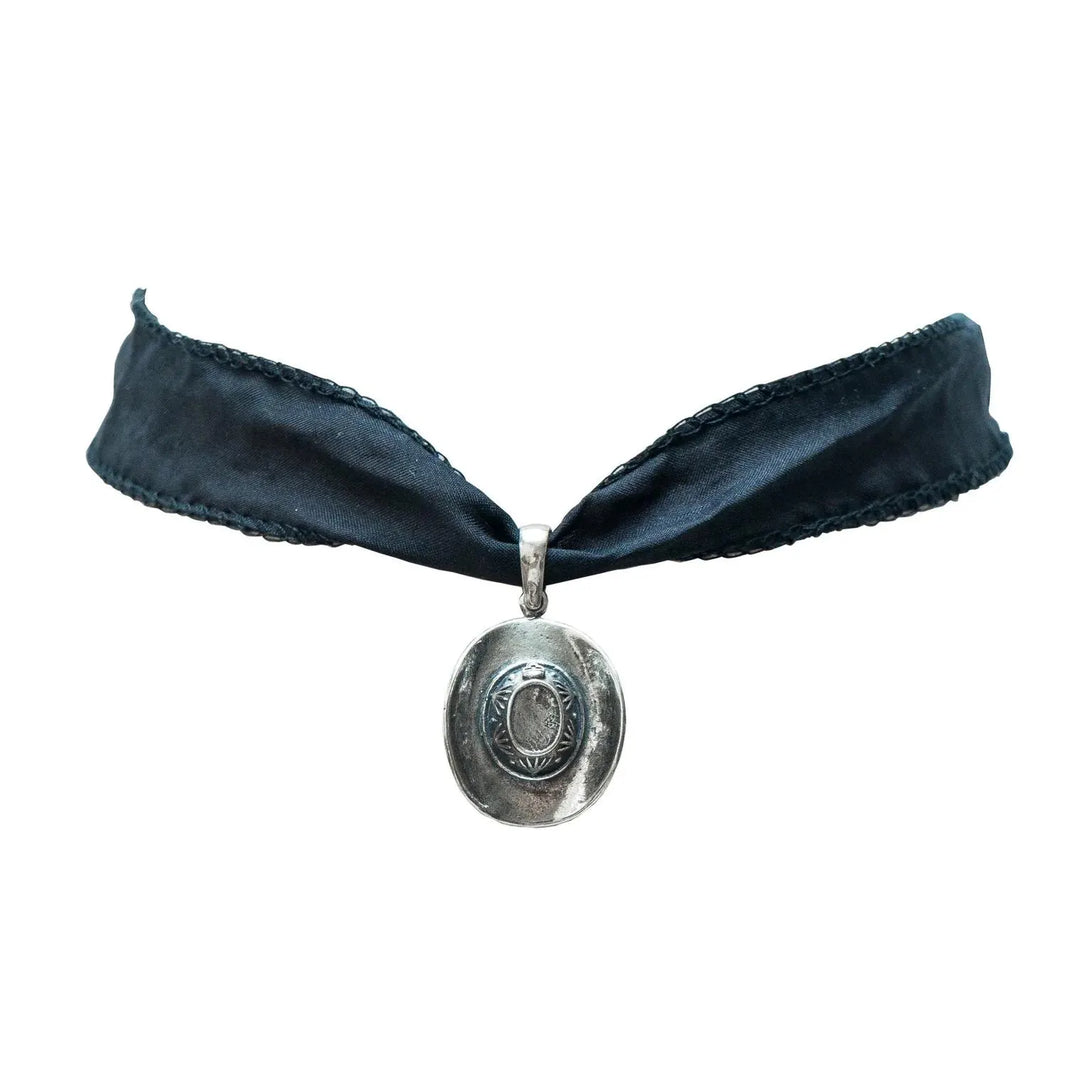 Mexican Silver .925 cowboy hat necklace with western pendant on white background