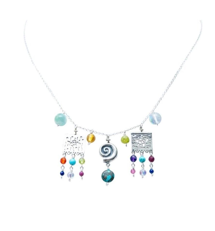 Mexican Silver .925 papel picado necklace with jade and colorful gemstone accents on white background