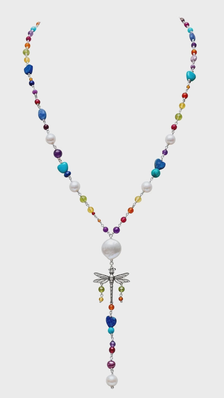 Colorful dragonfly gemstone necklace with Mexican silver pendant and freshwater pearls on white background