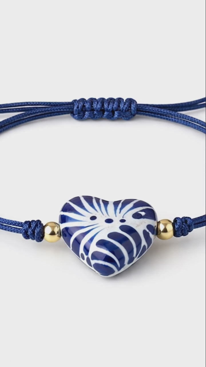Handmade Talavera Heart Shaped Bracelet in Silky Blue Cord from Puebla, Mexico.