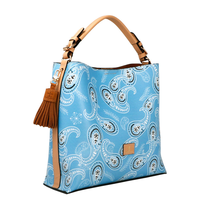Mexican leather shoulder bag with colorful bandana print and tassel on white background, suede interior tote, Bootsologie