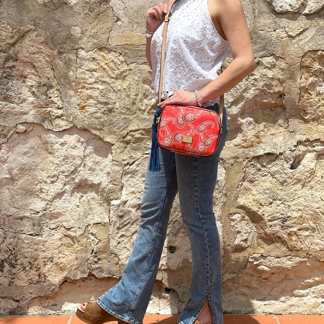 Woman wearing Mexican leather crossbody bag with bandana print detail, boho western outfit styling, Bootsologie handbag