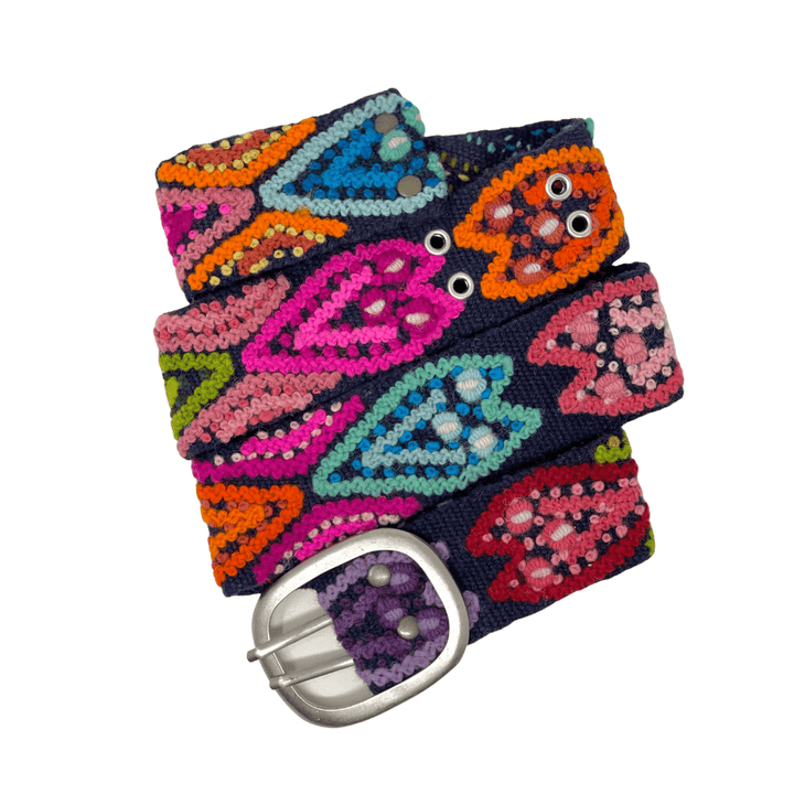 Close-up of handmade navy Peruvian belt with pink, turquoise, orange, purple, and green embroidery.